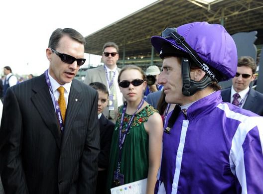 Aidan O'Brien & Johnny Murtagh talk after the race.