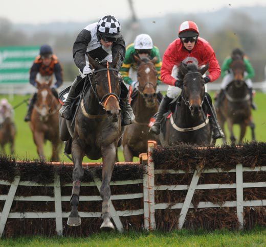 Dunguib clears the last ahead of Puyol
