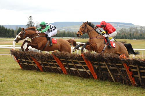 Max Almighty and Barry Cash far side jumps the last with Road Runner to win for trainer Andrew Kinsella 