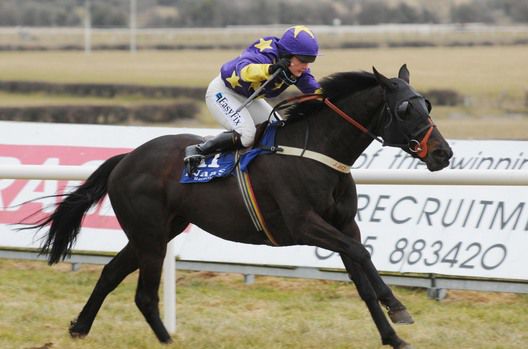 Katie Walsh and Hoochie Mama stride clear.