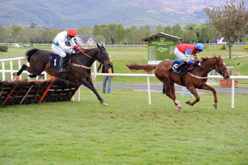 Bruach Na Mara and Brian Cooper leads away  from the last to win for trainer Billy Harney 
