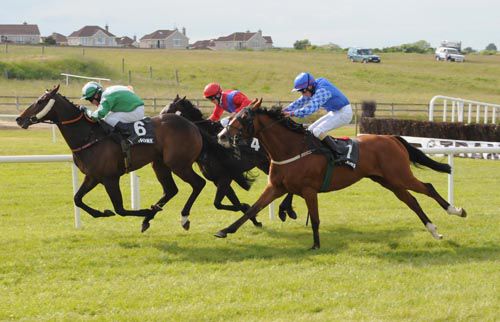 Alajan (right) finishes fast to win