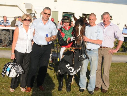 Dancera's connections, including jockey Paul Townend and trainer Mervyn Torrens (right)