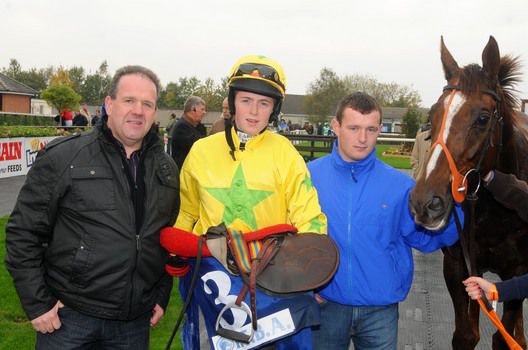 Owner James Ferry (left), jockey Keith Donoghue and trainer Emmett Butterly with Cybersnow