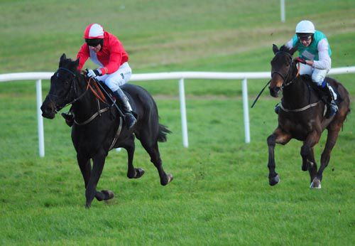 Roger Beantown (James Corky Carroll) stays on well to beat the odds-on Popcorn