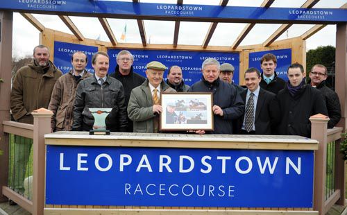 A presentation to Damian McElroy (sixth from right) by his press room colleagues