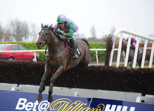 Ad Idem jumps the last, clear of Ballymak