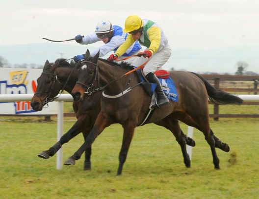 Canaly (nearside) is just too strong for Johnny McGeeney at Fairyhouse