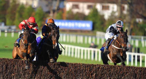 Gentle Alice (nearside) comes to beat Healys Bar (centre) & Coscorrig at Leopardstown