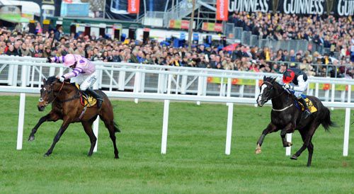 Zarkandar & Daryl Jacob strides away from Unaccompanied & Paul Townend.