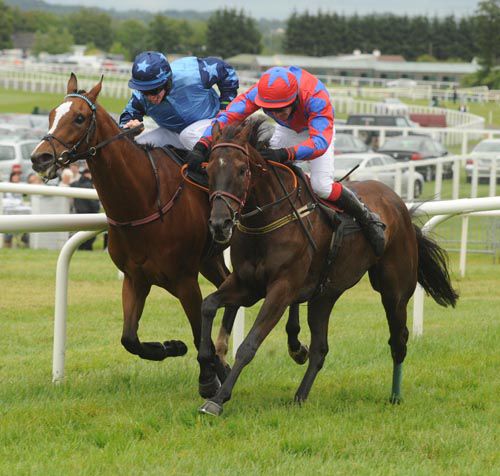 Mind The Steps and Rob Jones, right, just get up at Kilbeggan