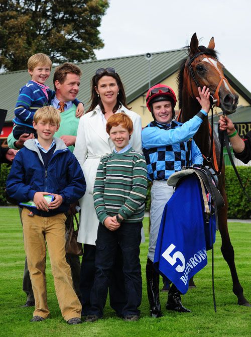 John Bleahen and wife Elaine, with kids Luke, Josh  and Ben, greet Fleur De Nuit and Declan McDonogh