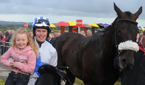 Shane Butler with his daugther Chloe and Heavenly Bound after their success 
