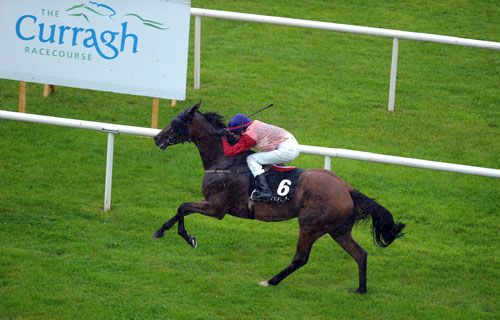 Takasima & Conor Hoban come home clear at at a rainy Curragh