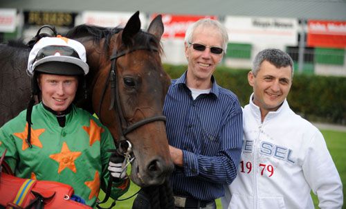 Paddy Mangan, Darren Pratt (right) and Tom Hartigan after Ever Dreaming lands double for absent trainer John Morrison 
