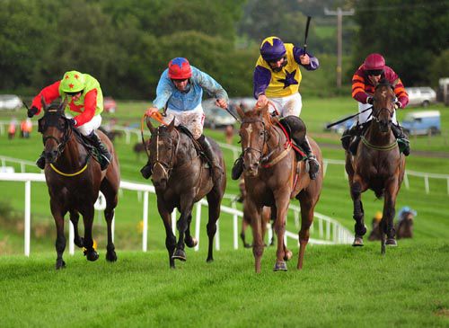 Luna Runner (right) holds off Mighty Snazy (light blue)