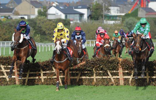 Beir Bua (right) stays on best to score from Leah Claire (centre) and Wither Hills (left)