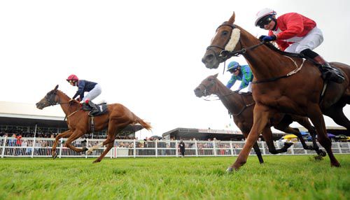 Darasal Wane & Marc Monaghan cross the line ahead of Independent Girl (nearest camera) & Measured Approval
