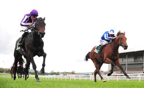 David Livingston and Seamus Heffernan (nearest) hold off Akeed Mofeed