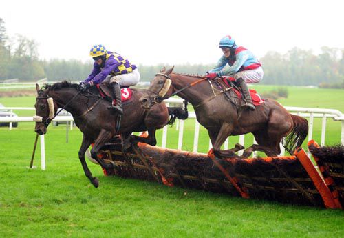 Killogan Lass and Tim Carroll lead Bennys Quest over the last