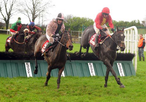 Letter Of Credit & Barry Geraghty (right) jump the last alongside eventual third The Ethiopian & Padraig Roche