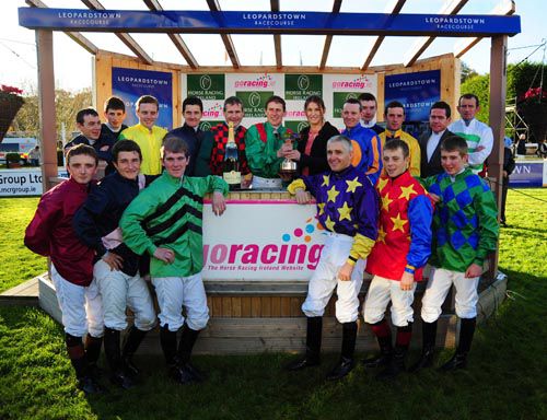 Katie Taylor presents Johnny Murtagh with his trophy surrounded by his weighroom colleagues