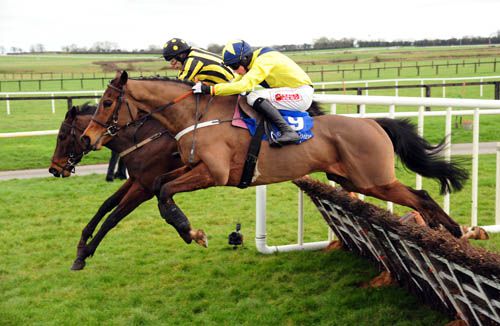 Burrenbridge Lodge (far side) jumps the last alongside runner-up Minsk