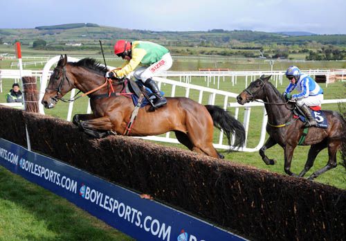 Sizing Europe leads Realt Dubh over the last at Punchestown