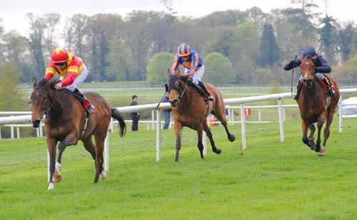 Tannery is clear under Niall McCullagh approaching the line with Chrysanthemum (blinkers) & Soon giving chase