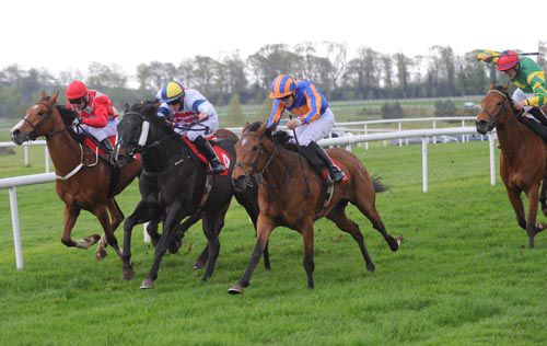 Oh Happy Days (blue & orange) stays on best under Billy Lee to score from Summer Knight (cheekpieces)