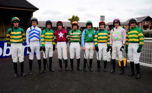 J.P.McManus had five of the nine runners in the beginners' <br>chase - winning jockey Ruby Walsh is second from right