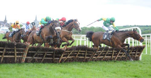 Caim Hill (right) blunders over the last as Victrix Gale (noseband) comes through to score