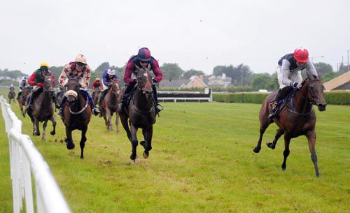 Ourbeautifuldream (right) gets up to win from Dani Catalonia (centre) and Crystal Earth