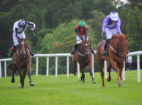 Peking To Paris (right) wins from Kilcooley Castle (left) with third Market Option also in shot
