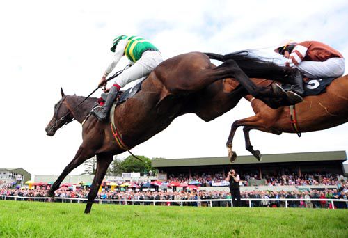 Clara More jumps the last in front with Renoyr on his outside