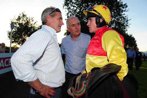 Tony Martin (left) & winning owner Adrian Collins (centre) with Barry Geraghty after he partnered Tepalo to victory