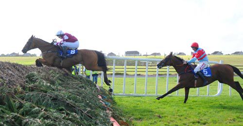 Sweet My Lord jumps the last ahead of Lord Ben (Davy Russell without irons)