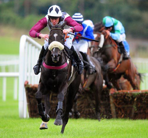 Ms Bliss and Andrew McNamara on their way to victory