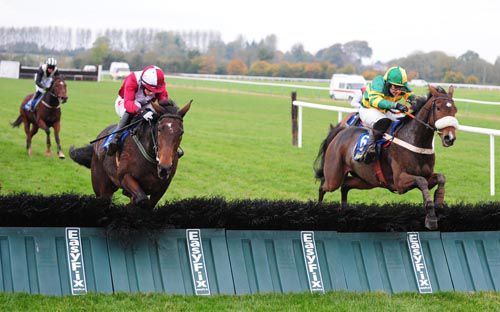 Grange (right) jumps the last alongside Shesonlyahorse