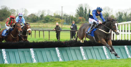 Dactik and Davy Russell clear the last hurdle 