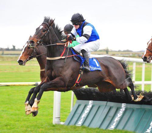 Blacklough jumps the last from Akatara (inside) at Fairyhouse