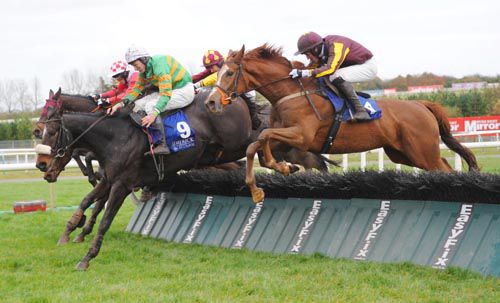 Bullet Street comes with his challenge on the outside as Gentleman Duke (No 9) leads over the last