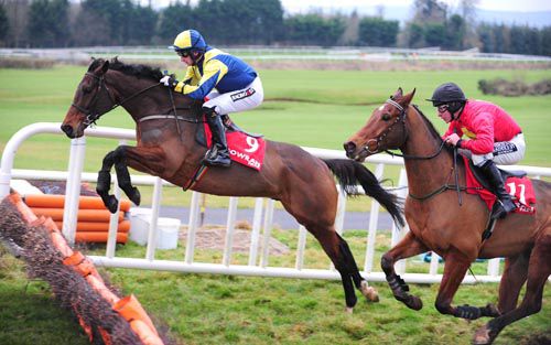 A lovely leap from Mozoltov at Gowran as he leads Written Inthestars
