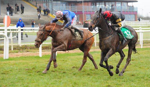 Hillman (right) hangs on from Easy Vic