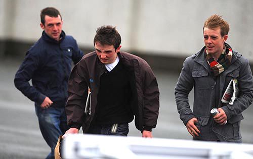 Rory Cleary, Chris Hayes and Ben Curtis brave the elements to arrive at Dundalk this evening