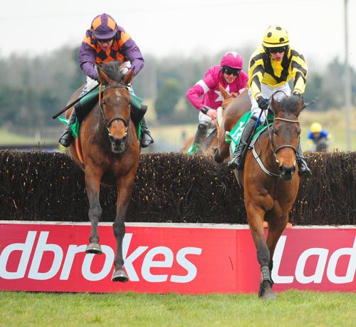 Solstice Knight, left, comes to tackle Sea Master at Fairyhouse