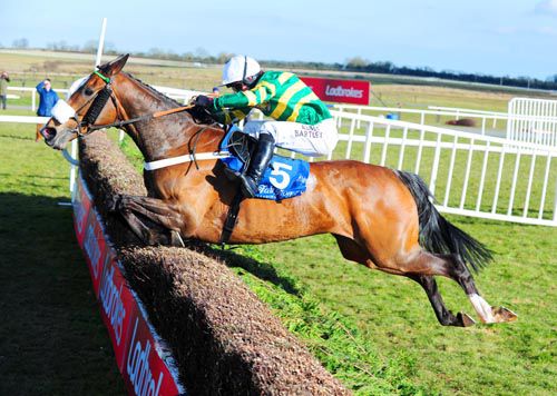 Nadiya De La Vega jumps the last under Tony McCoy