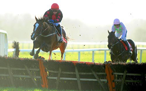 Spot The Pro jumps the last from Dougal Philps back in second