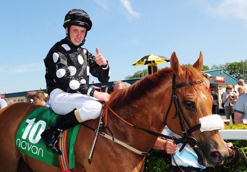 Thumbs up from Dylan Robinson as he returns to the parade ring aboard Speed Dream