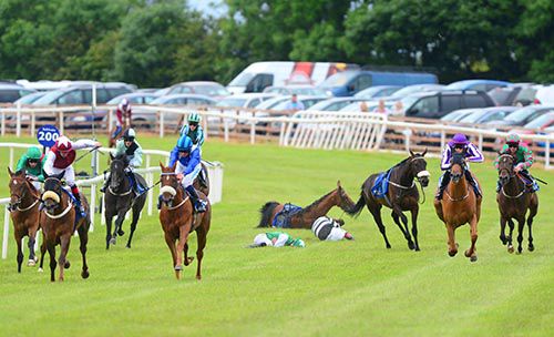 The drama at Ballinrobe is well illustrated by his pic.Pastiches (left) and Daymoona (blue, 1st) battle it out up front